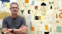 Nicholas Wilton, painter and educator Photo of Nick Wilton in front of one of his paintings